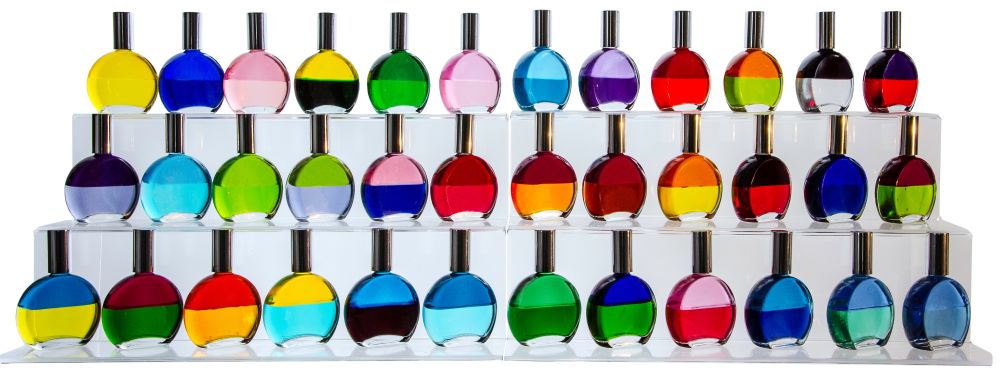 Colour Therapy Bottles Lined Up On Shelves